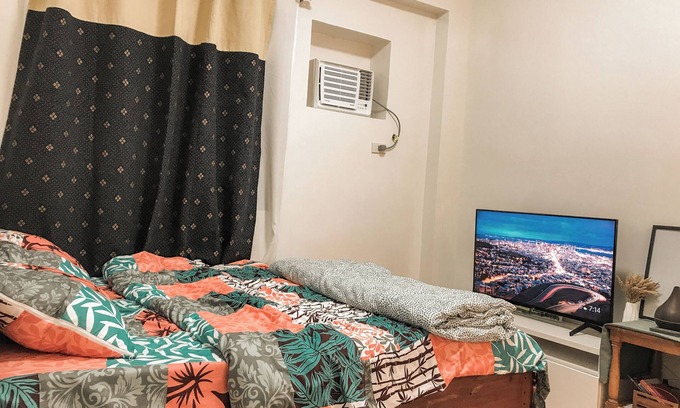 Novaliches Condominio | Comfy Queen bed + Pull-out, Netflix, Mall Nearby
