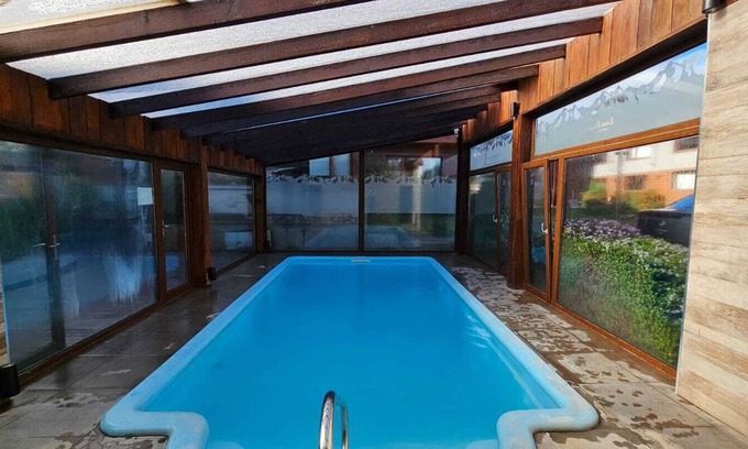 Dina Huapi Cabina | COMPLEJO RAICES PATAGONICAS CABAÑA CLASICA
