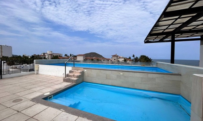 Zona Dorada Condominio | bonito depa/100 pasos de la playa by Gpsrentas