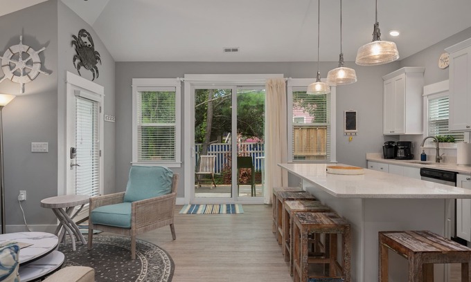 Whalehead Beach Casa | Condo with Private Hot Tub! Dogs ok! Short walk to beach, comm. Pool