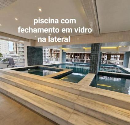 Caicara Apartamento | condominio clube com piscina climatizada com fechamento em vidro - Vila Caiçara - Praia Grande 4 adultos e 1 criança até 12 anos