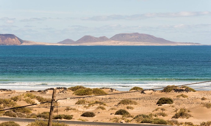 Caleta de Famara Apartamento | Conylanza Casa Blueview la playa de Famara en tu terraza