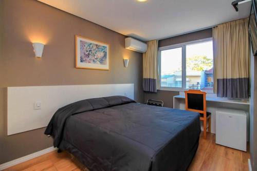 Menino Deus Hotel | CORAL EXPRESS Prox PUCRS, 5klm de distancia e Hospitais