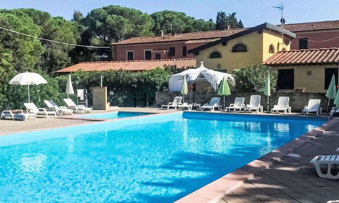 Cecina Apartamento | Hermoso apartamento para 3 personas con A/C, piscina, WIFI, TV, mascotas permitida y aparcamiento