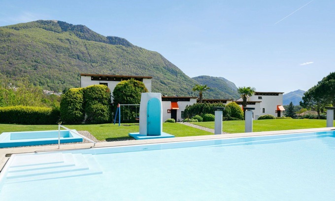 Capriasca Apartamento | Apartamento con piscina, WIFI, TV, patio, mascotas permitida, vista panorámica, aparcamiento