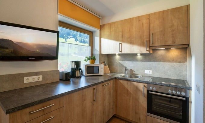 Niederau Apartamento | Acogedor apartamento para 4 personas con WIFI, TV, balcón y aparcamiento