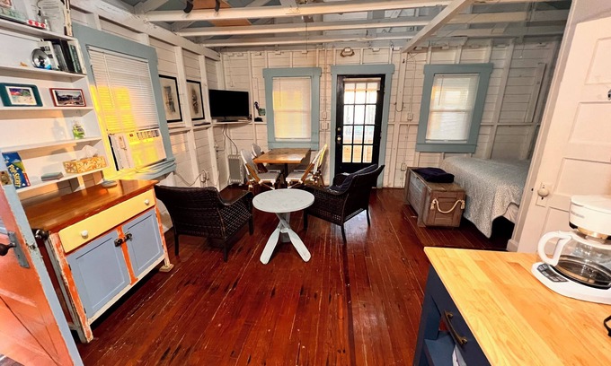 Bradenton Beach Cabaña | Cottage A of Historic Waterfront Fish Camp. Private Dock. Minute walk to Beach