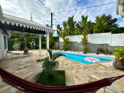 Tartane Casa | Cottage Palmier Rouge