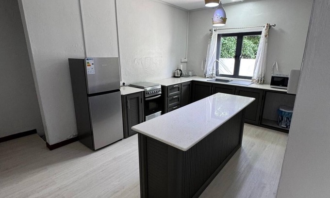 Roches Noires Casa | Cozy 2 bed-room house with beautiful front yard; 15 minutes to the beach.