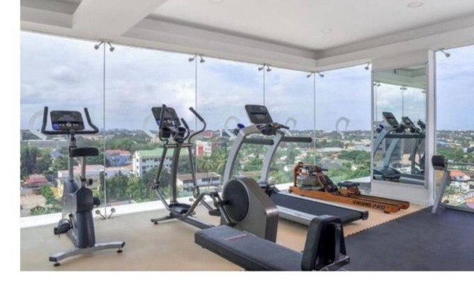 North Ridge Casa | Cozy 2-bedroom penthouse apartment in heart of Accra with WiFi, AC, fitness room
