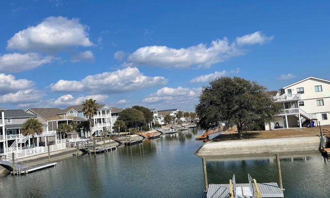 Ocean Isle Beach Cabaña | Cozy 5BR-2BA Cottage on Canal, Private Heated Pool, Private Boat Dock