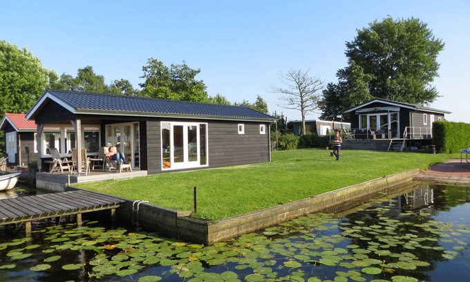 Municipality of Kampen Casa | Acogedora y rústica cabaña más casa flotante en el agua