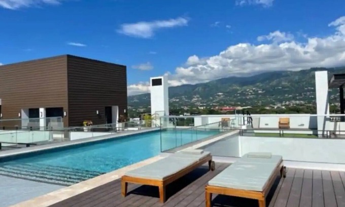 New Kingston Apartamento | Cozy apartment in new Kingston w/rooftop pool, super close to A/C Marriott.