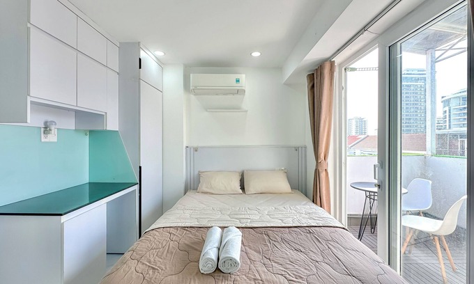 Phu My Hung Apartamento | Cozy balcony studio in D7 with chill rooftop