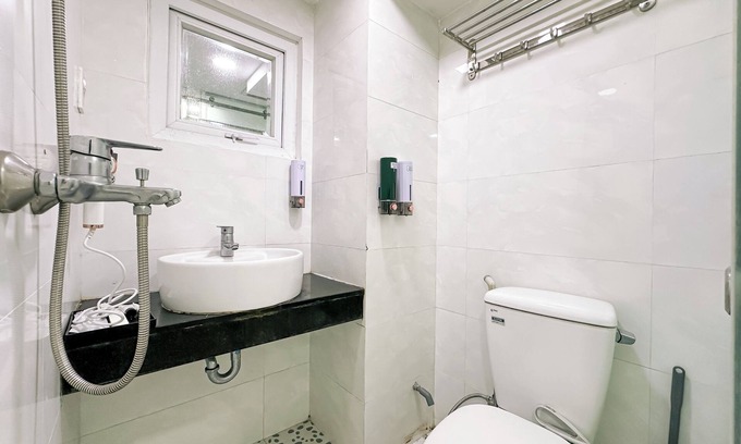 Tan Qui Dong Apartamento | Cozy budget room in D7 with chill rooftop