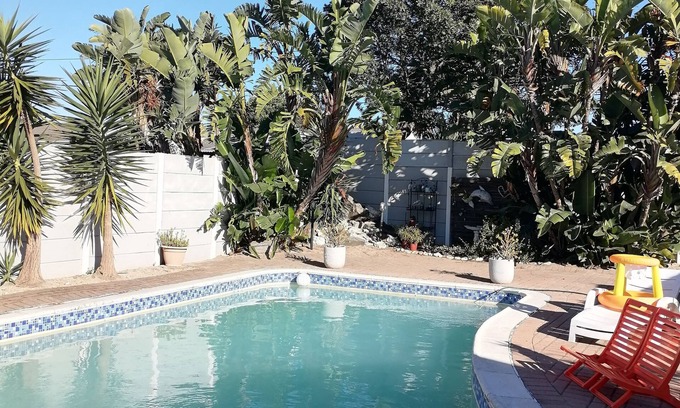 Cape Town Cabaña | Cozy cottage for family getaway with private patio and pool in safe suburb.