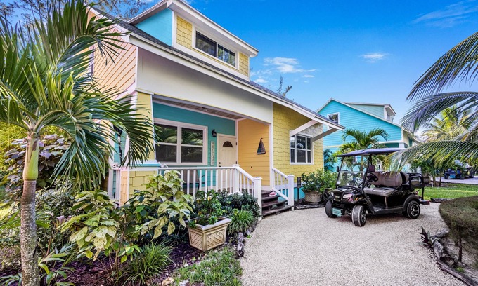 Spanish Wells Casa | Cozy Cove Cottage en la tranquila calle sin salida 400 de la hermosa playa de arena blanca