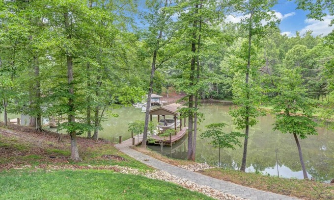 Moneta Casa | Cozy Cove- Fenced yard for your dog and calm waters to swim for the family