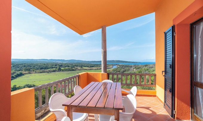 Barrabisa Apartamento | Acogedor apartamento vacacional "Conchiglia Blu" con jardín