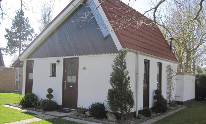 Stellendam Casa | acogedora casa de vacaciones en un parque para niños