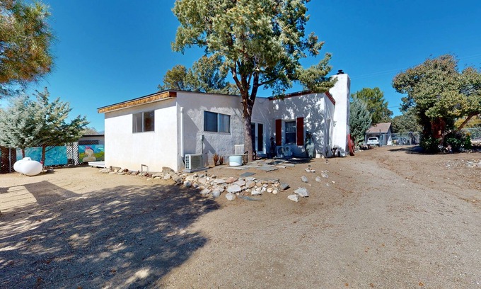 Pinyon Pines Casa | Cozy home with picturesque views of the mountains, a fireplace, and internet