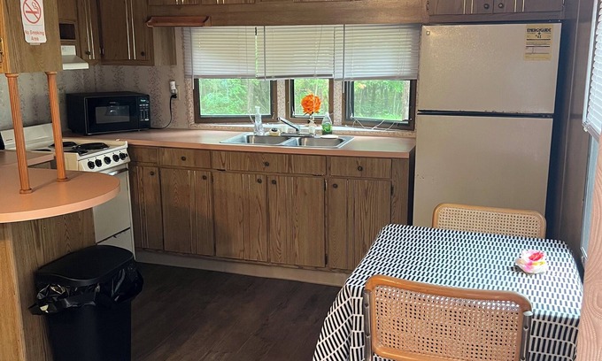 Easton Casa | Cozy mobile home/cabin on campground in Adams, WI.