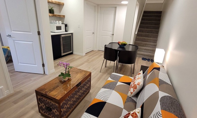 Southeast Calgary Casa | Cozy new unit near restaurants, bars, stores, bus stations, and hospital.