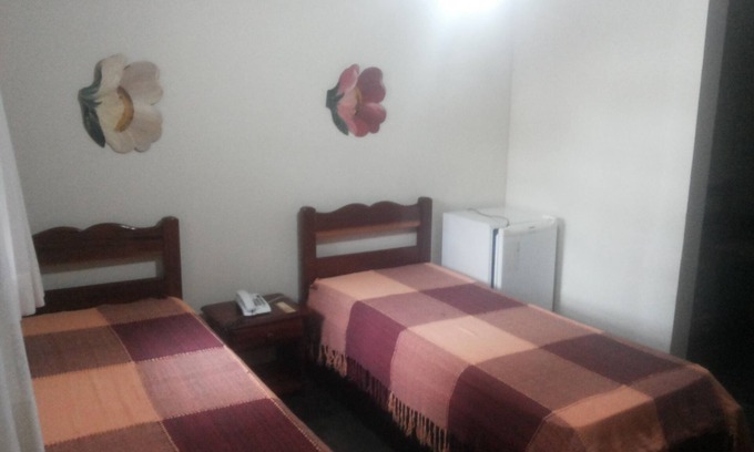 Maria Paula Casa | Aconchegante Pousada en Pendotiba - Habitación para 04 personas