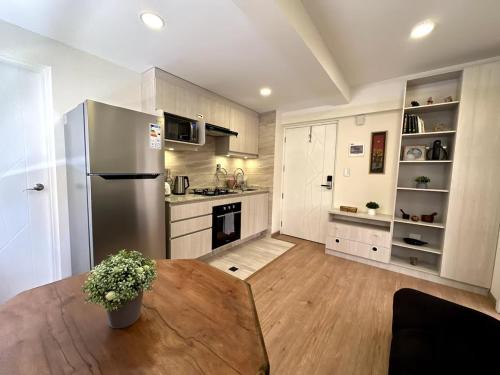 Macrodistrito Sur Apartamento | Cozy smart studio & home office