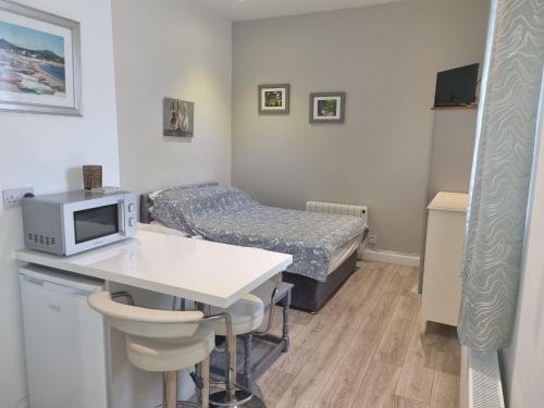 Roundwood Apartamento | Cracatinni Mews
