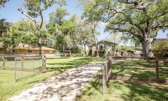 Cedar Lane Casa | Creek Front Home w/ Fishing Pier & Amazing Outdoor Spaces