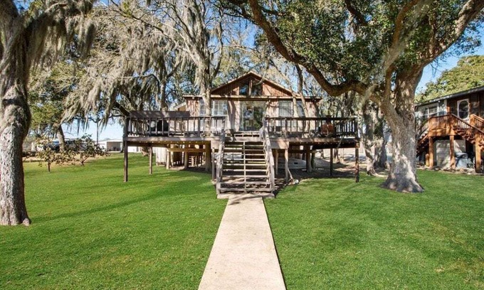 Cedar Lane Casa | Creekfront Cottage w/ Boat Lift & Pier