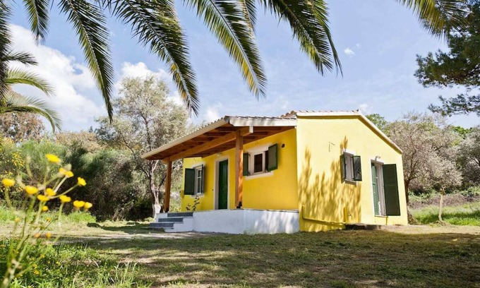 Almiros Beach Casa | Cute yellow Handmade House with tree garden