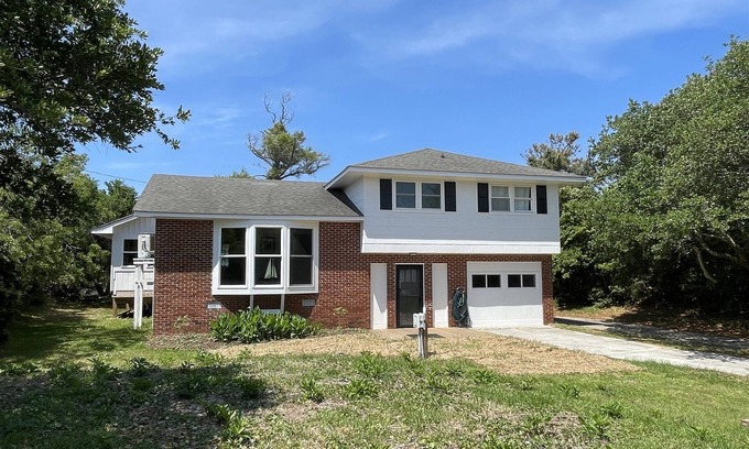 Buxton Cabaña | Cypress Cove, situated in Buxton on a soundfront lot, provides a peaceful setting in this charming rental cottage.