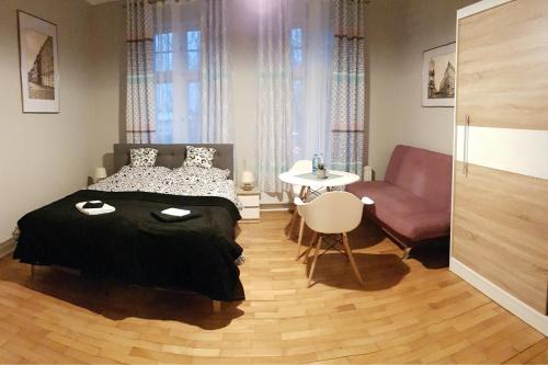Gniezno Casa | Czarna Owca- Pokoje Gościnne