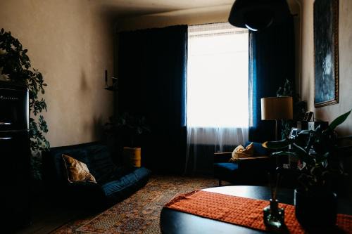 Centrs Apartamento | Dark & Moody Mid Century Apartment
