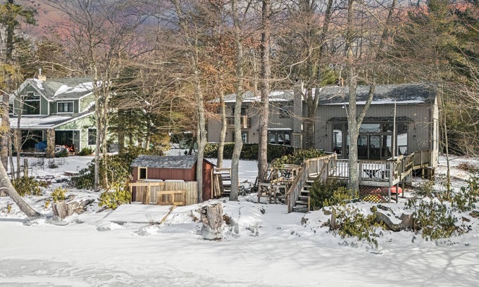 Tafton Casa | Deck w/ Lake Views, Fireplace, Shuffleboard, and Office | Lakeside Retreat