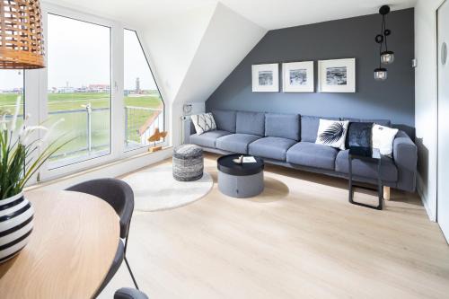 Juist Apartamento | Deichloft - mit Watt- und Hafenblick