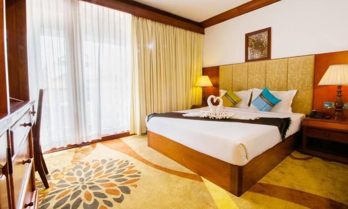 Taphul Village Area Casa | Deluxe King Pool View en el hotel temático Angkor Year