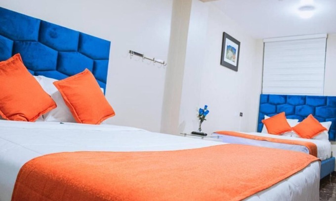 Santiago de Surco Apartamento | Deluxe Queen Room with Two Queen Beds 4