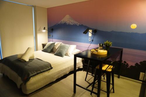 Downtown Santiago Apartamento | Departamento full equipado a pasos del movistar arena, moderno y cómodo con toda la magia del sur