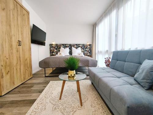 Mitte Apartamento | Design Apartment für bis zu 4 im 2 OG, modern, Dachterrasse, Grill, ruhige Lage, Disney plus, Wii, LAN und WLAN