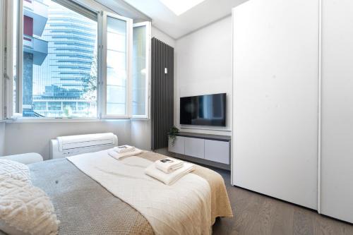 Centro Direzionale Apartamento | Designed apartment in Milan center Gae Aulenti area with AC, WiFi and Subway airport connected steps from Central Station