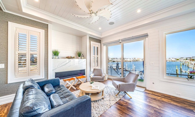 Stone Harbor Casa | Discover an extraordinary waterfront haven with this magnificent bayfront residence that boasts a.
