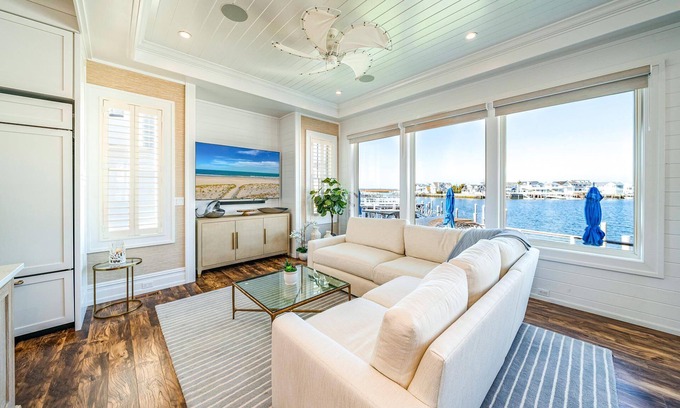 Stone Harbor Casa | Discover the epitome of coastal living in this exceptional bayfront residence, a true gem boasting.