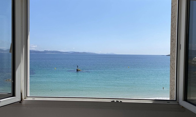 Sanxenxo Apartamento | Disfruta Sanxenxo en Ventana al mar Home frente a la playa Silgar