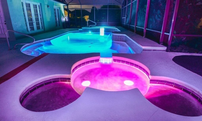 West Kissimmee Casa | Disney theme rooms,Splashpad, Movie Theater, Private Pool