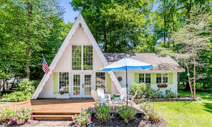 Charlevoix Casa | Dog-friendly A-frame home near beaches & downtown with firepit, deck, badminton