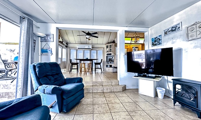 Port Isabel Casa | Dog-friendly bayfront home with in/outdoor pools, tennis, gym, W/D, bay views