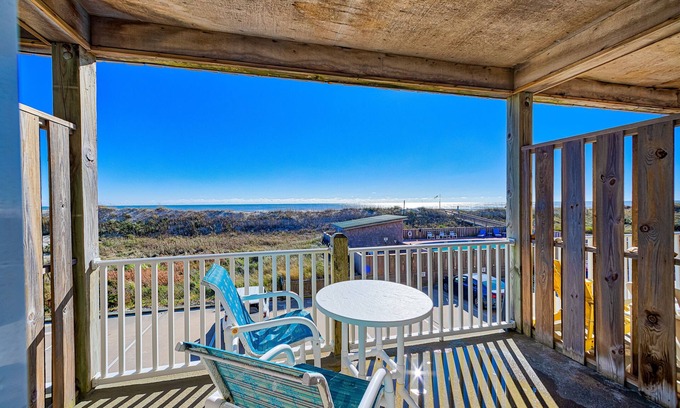Hatteras Condominio | Dog-friendly oceanfront condo with balcony, outdoor pool, hot tub, and central AC